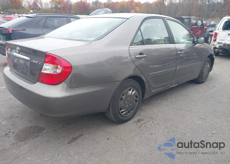 2003 Toyota Camry Le z USA, uszkodzony, nr VIN 4T1BE32K93U688485